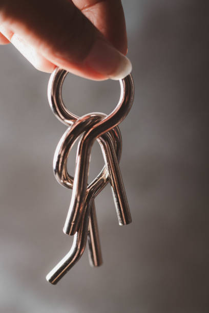 istock A hand holding a silver metal hoop 1398311240