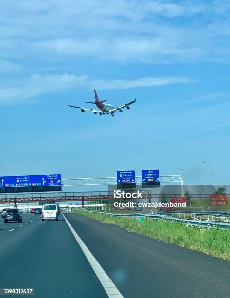 Airplane And Traffic Stock Photo - Download Image Now - Amsterdam Schiphol Airport, Traffic, Airplane
