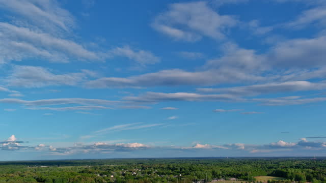 Gorgeous panorama cloud on sky scenic the over American town Inman with houses roofs between the forest