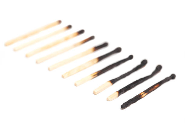 istock Different stages of match burning. Burnt matches isolated on white background 1398317718