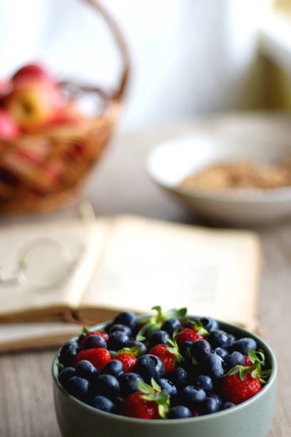 istock Fruit, Cookies, Books and Glasses 1398323434