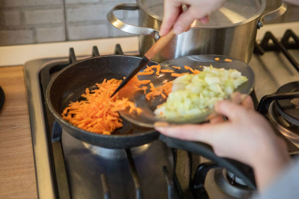 istock carrot and onion on frying pan 1398325015
