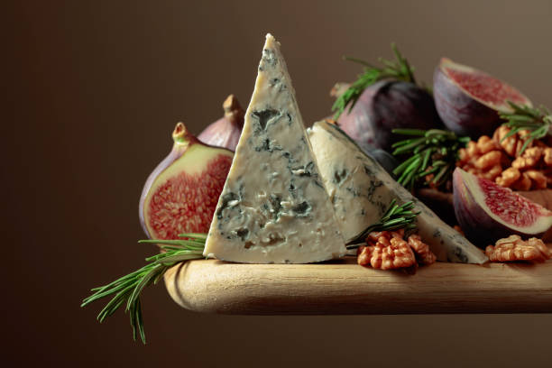 istock Blue cheese with figs, walnuts, and rosemary. 1398325540