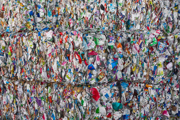 istock Recycled and packaged waste. Sustainable industry. Reusable material 1398326994