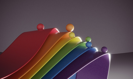 The balls riding on the multicolored wavy ribbons on gray background, can be used in balance, career growth, money improvement, variation etc. concepts. (3d render)