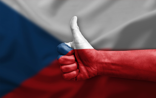 Hand making thumb up painted with flag of czechia