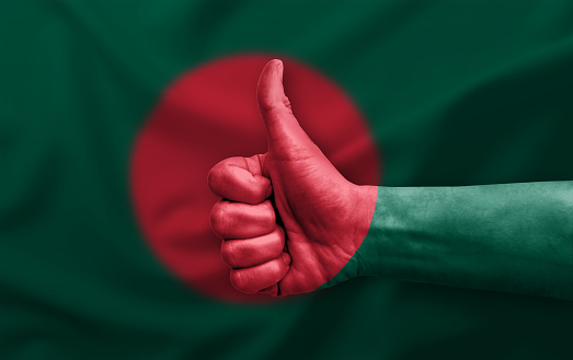 Hand making thumb up painted with flag of bangladesh