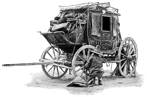 A Mexican vaquero repairing a broken wagon wheel on a stage coach in Mexico. Vintage halftone etching circa 19th century.