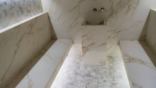 istock Classic turkish hammam. White turkish bath with marble surfaces. Marble oriental bathroom. Steam bath interior. 1398344061