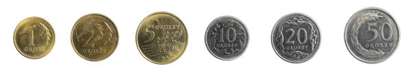 istock Polish gold and penny coins on a white isolated background 1398344252