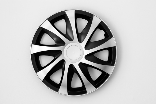 3d rendering black tire with alloy wheel isolated on white