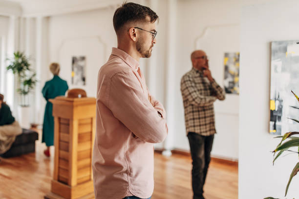 istock Man in art gallery 1398348396