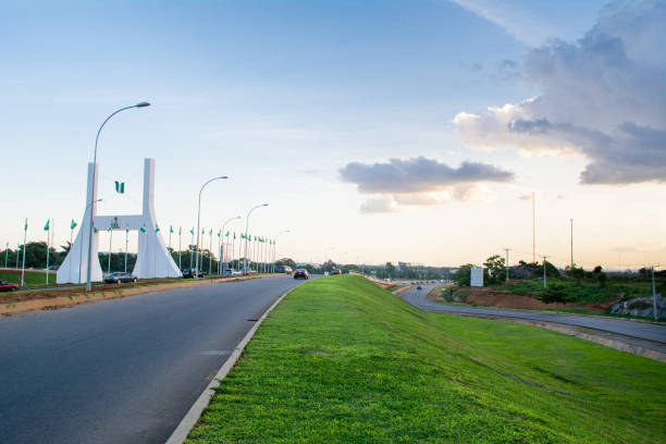 Abuja, Nigeria Landscape at sunset A shot of the city gate of abuja, Nigeria showing the sunset. city gate stock pictures, royalty-free photos & images