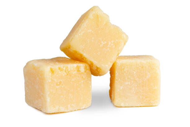 istock Parmesan grana padano cheese cubes isolated on white . 1398350629