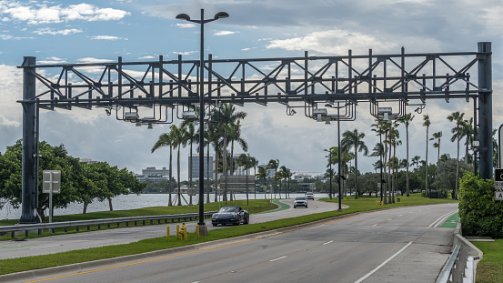 Highway tolls on the Broad Causeway heading to Bay Harbor Islands, Miami Beach, Florida.