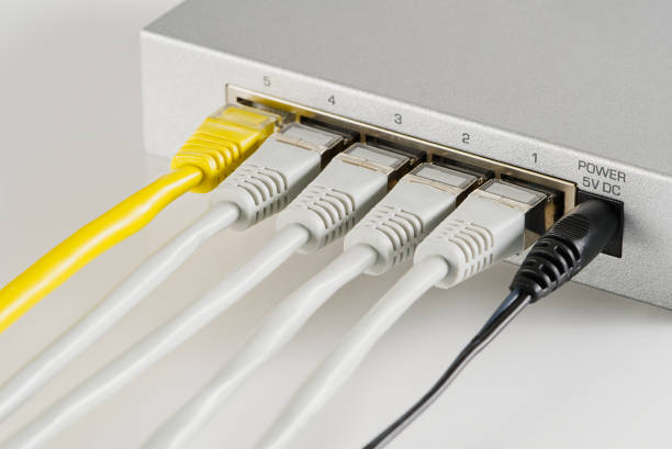 istock Small router and switch. tcp ip network business concept. High - performance gigabit switch. 1398352328