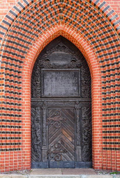 istock Gothic arched medieval church door 1398353335