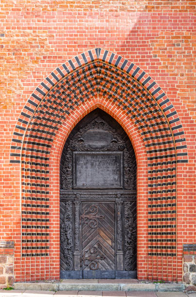 istock Gothic arched medieval church door 1398353336