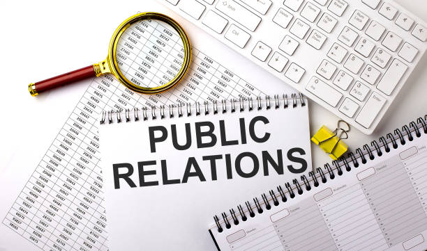 istock PUBLIC RELATIONS text written on a notebook on chart with keyboard and planning 1398354354