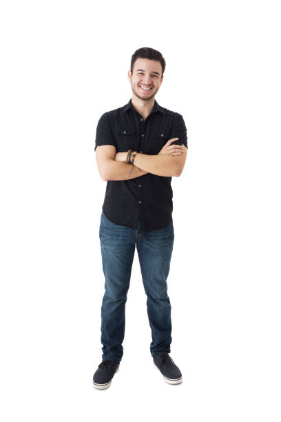 Portrait of a cool Cool latin man smiling with arms crossed on isolated white background