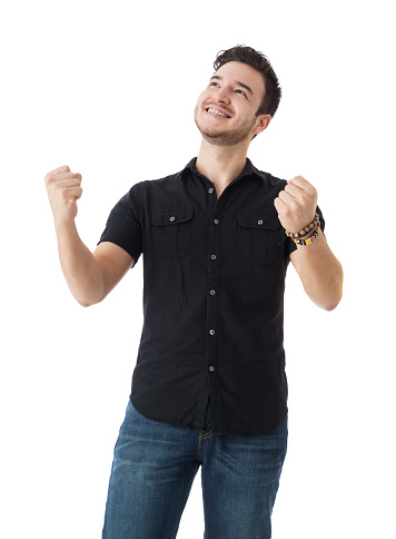 Portrait of a successful man against a white background, looking up.