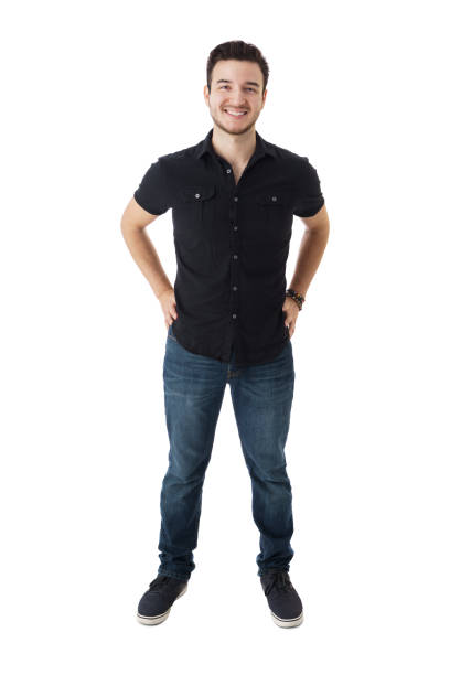 istock Happy young men with hands on the back smiling at camera 1398355872