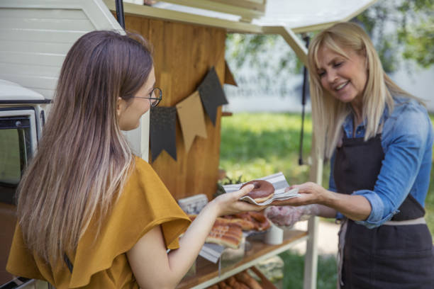 istock Women working at mobile bakery trucks 1398357066