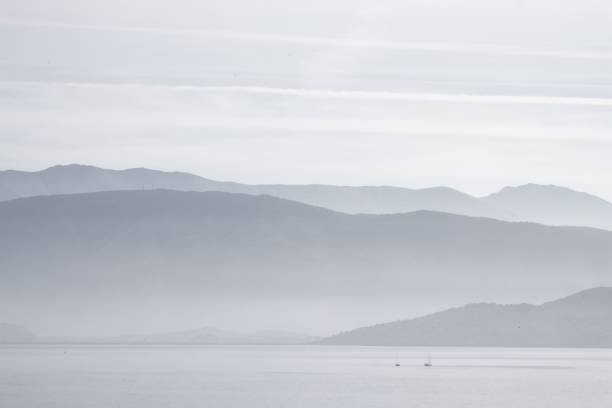 Silhouettes of the Albanian mountains in the morning dust