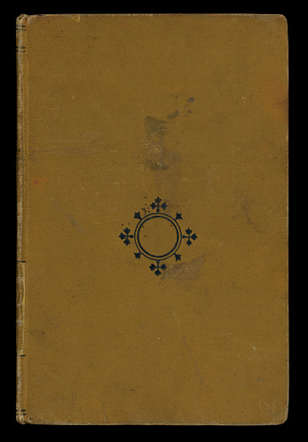 Old 19th century book open on both blank pages with stains and scratches.