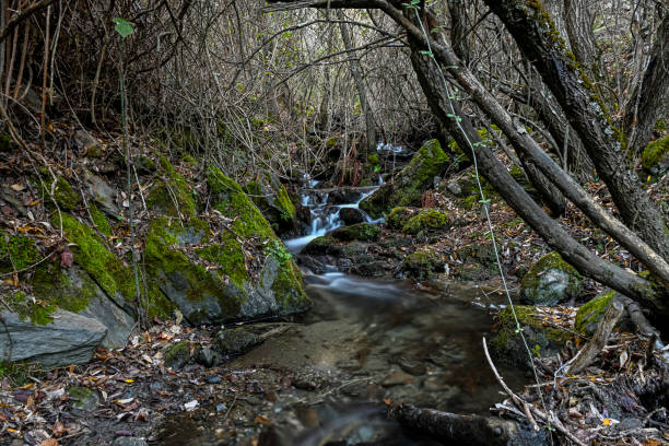 istock Small waterfall in the Camarate stream, Granada. 1398359760