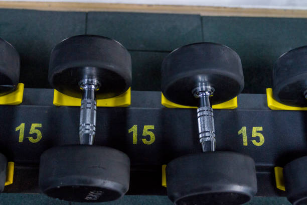 15 Kg Dumbbells At Gym stock photo
