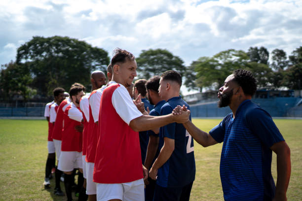 istock Soccer players shaking hands before the match 1398367379