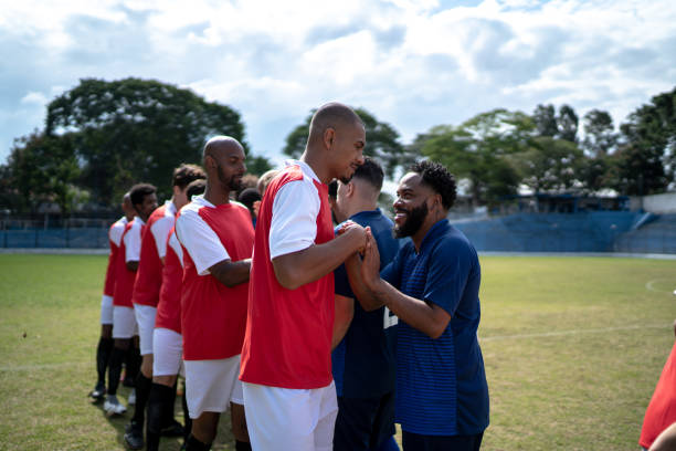 istock Soccer players shaking hands before the match 1398367389
