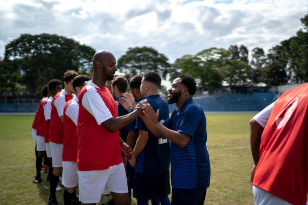 istock Soccer players shaking hands before the match 1398367390