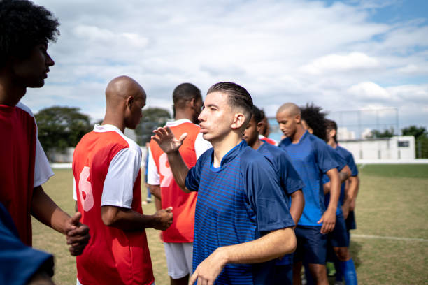 istock Soccer players shaking hands before the match 1398367399