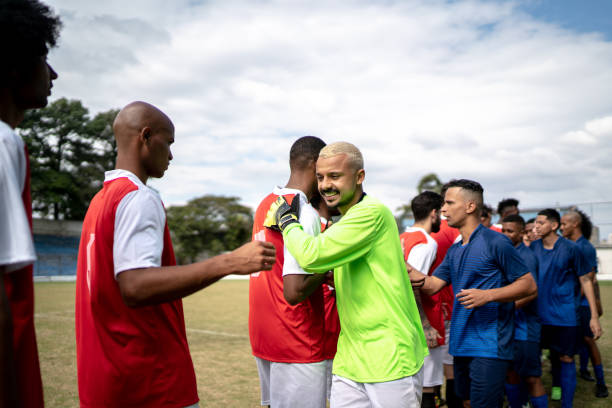 istock Soccer players shaking hands before the match 1398367429