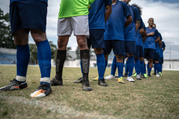 istock Low section of soccer team in a row 1398367440