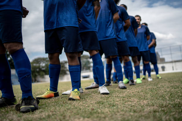 istock Low section of soccer team in a row 1398367488