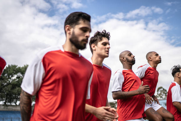 istock Soccer players warming up before a match 1398367925