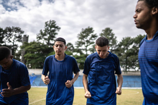 istock Soccer players warming up before a match 1398367936