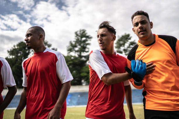 istock Soccer players greeting before a match 1398367950
