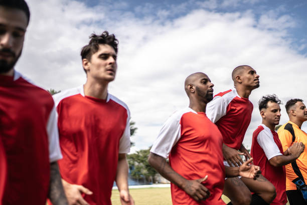 istock Soccer players warming up before a match 1398367956