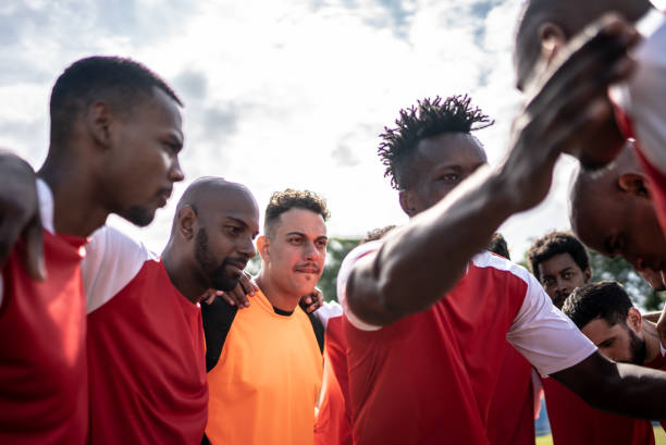 istock Soccer team captain talking to the team before a match 1398367957