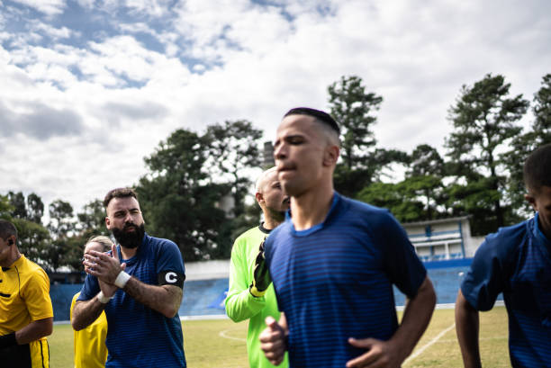 istock Soccer players warming up before a match 1398367959