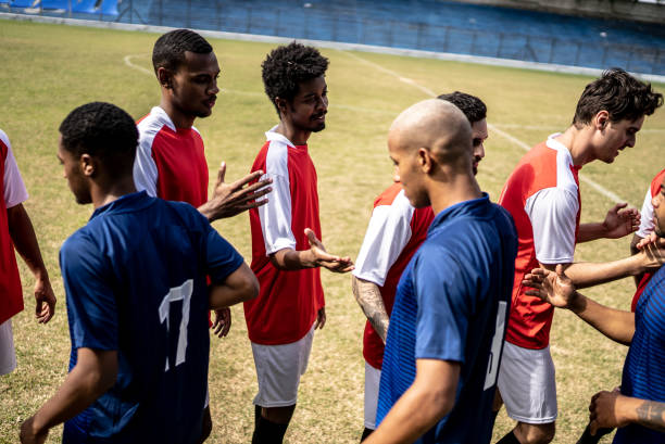 istock Soccer players teams greeting before a match 1398367973
