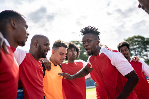 istock Soccer team captain talking to the team before a match 1398367974