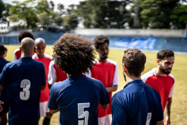 istock Soccer players teams greeting before a match 1398367993