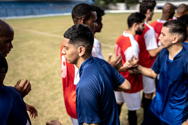 istock Soccer players teams greeting before a match 1398368007