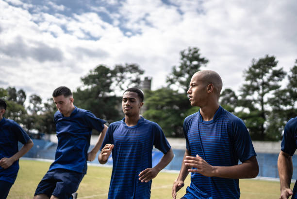 istock Soccer players warming up before a match 1398368008