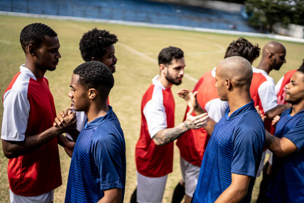 istock Soccer players teams greeting before a match 1398368019